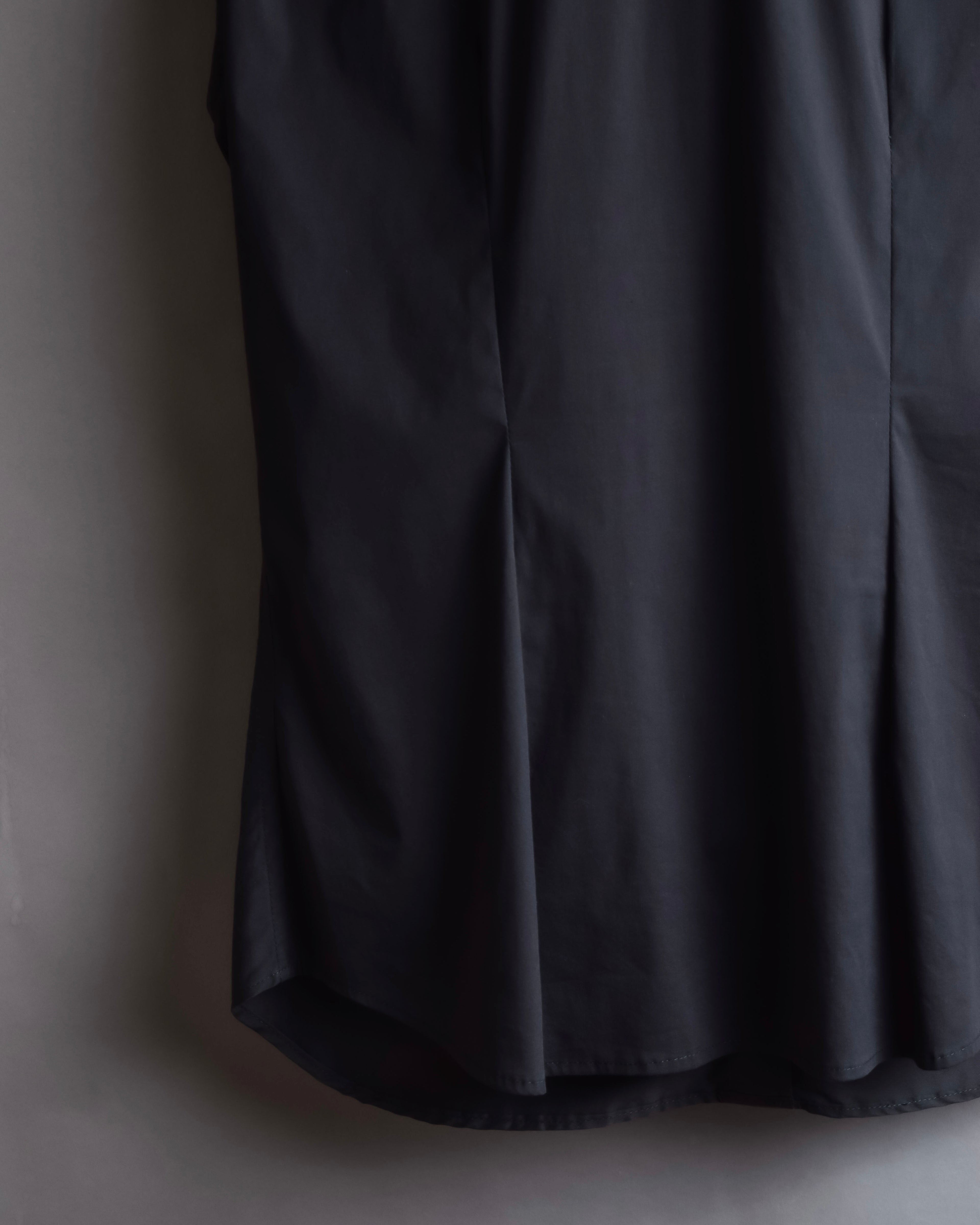 "Yves Saint Laurent Rive Gauche"
Twisted front sleeveless shirt