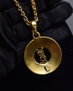 "YVES SAINT LAURENT" Embossed medallion YSL charm necklace