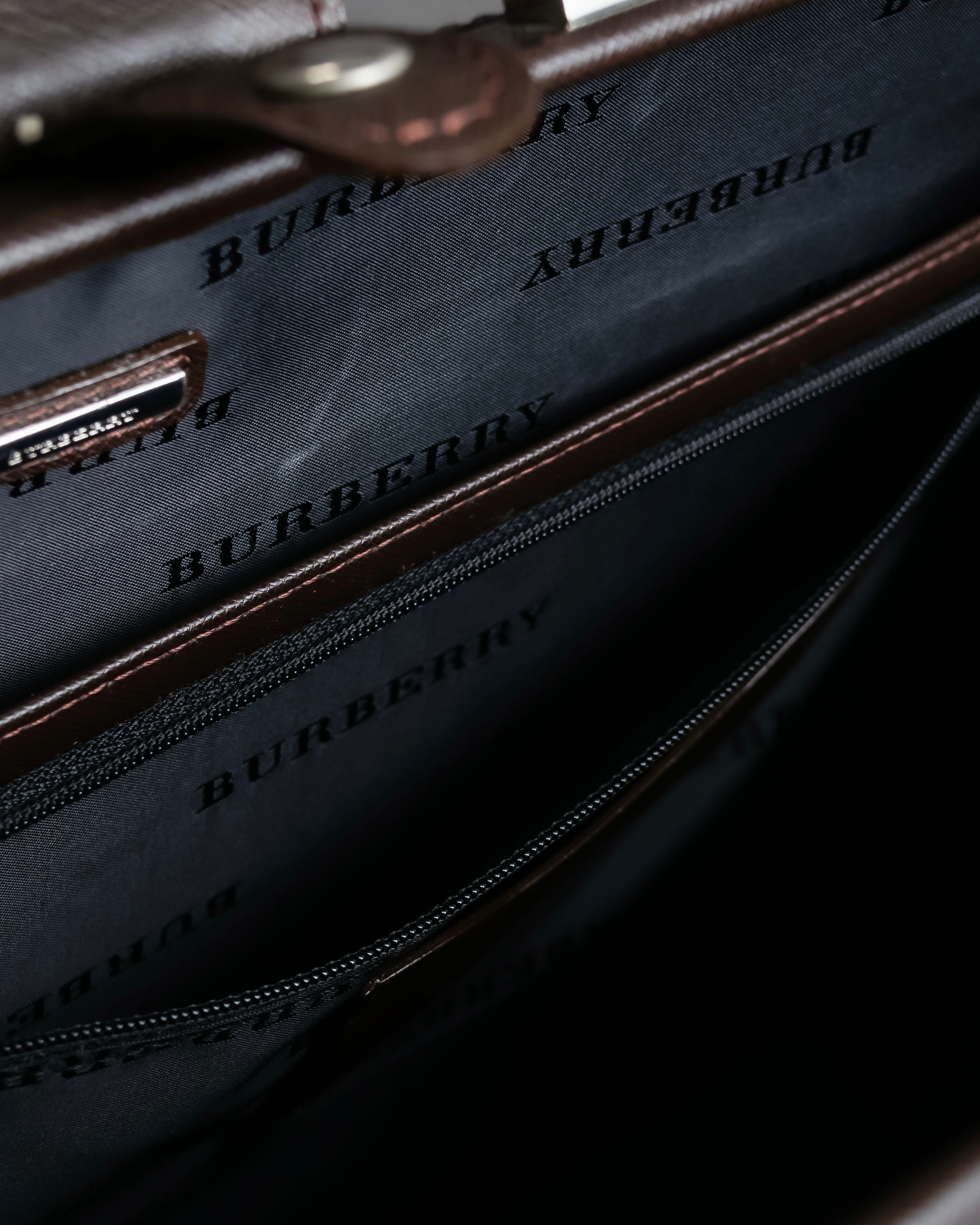 "BURBERRY" Metal belt design embossed PVC briefcase