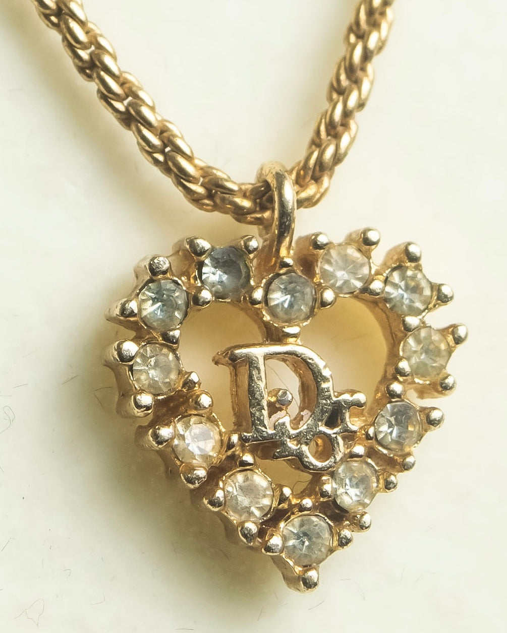 "Christian Dior" Rhinestone studded CD logo design in gold necklace