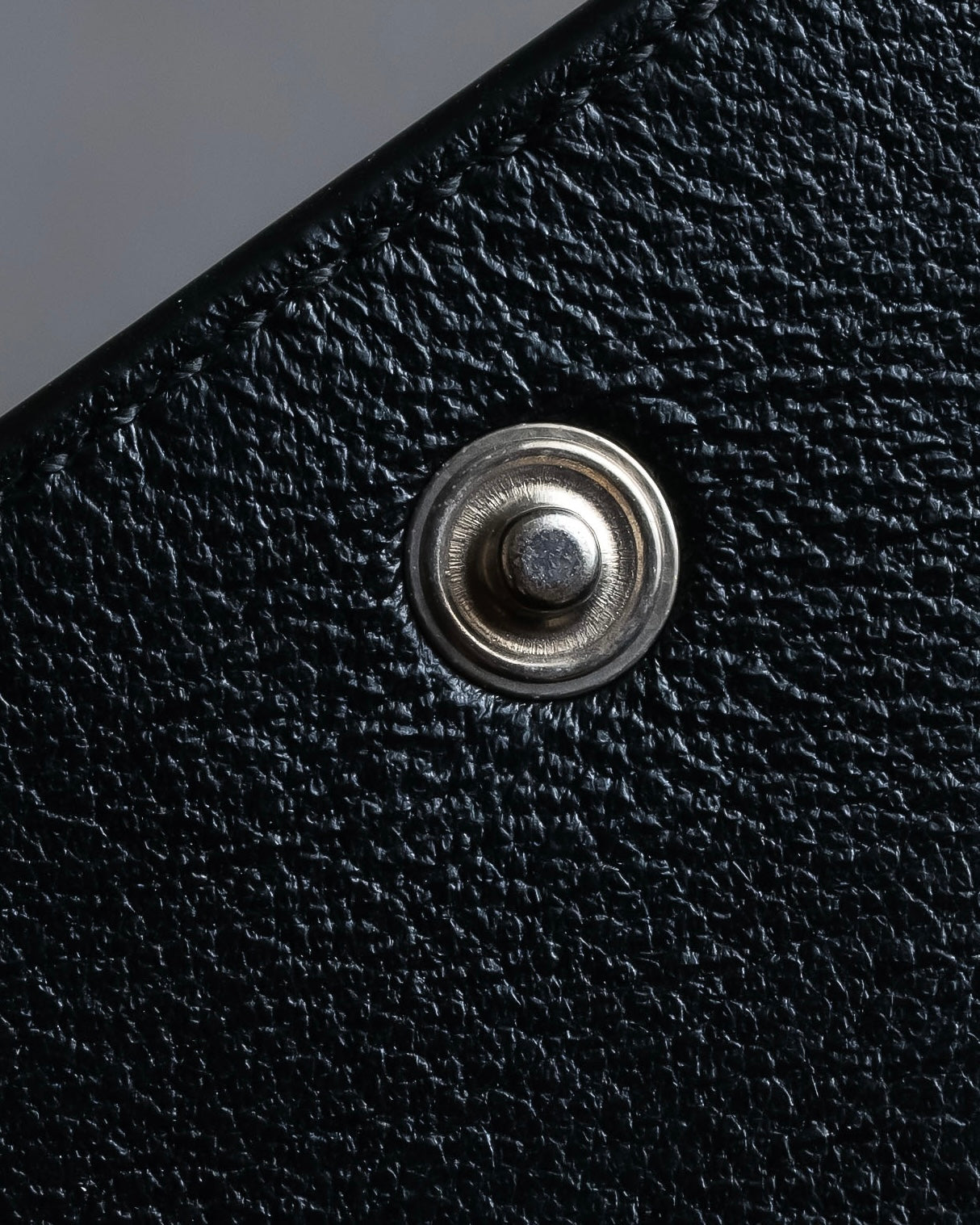 "BALENCIAGA" Logo engraved compact leather tri-fold wallet