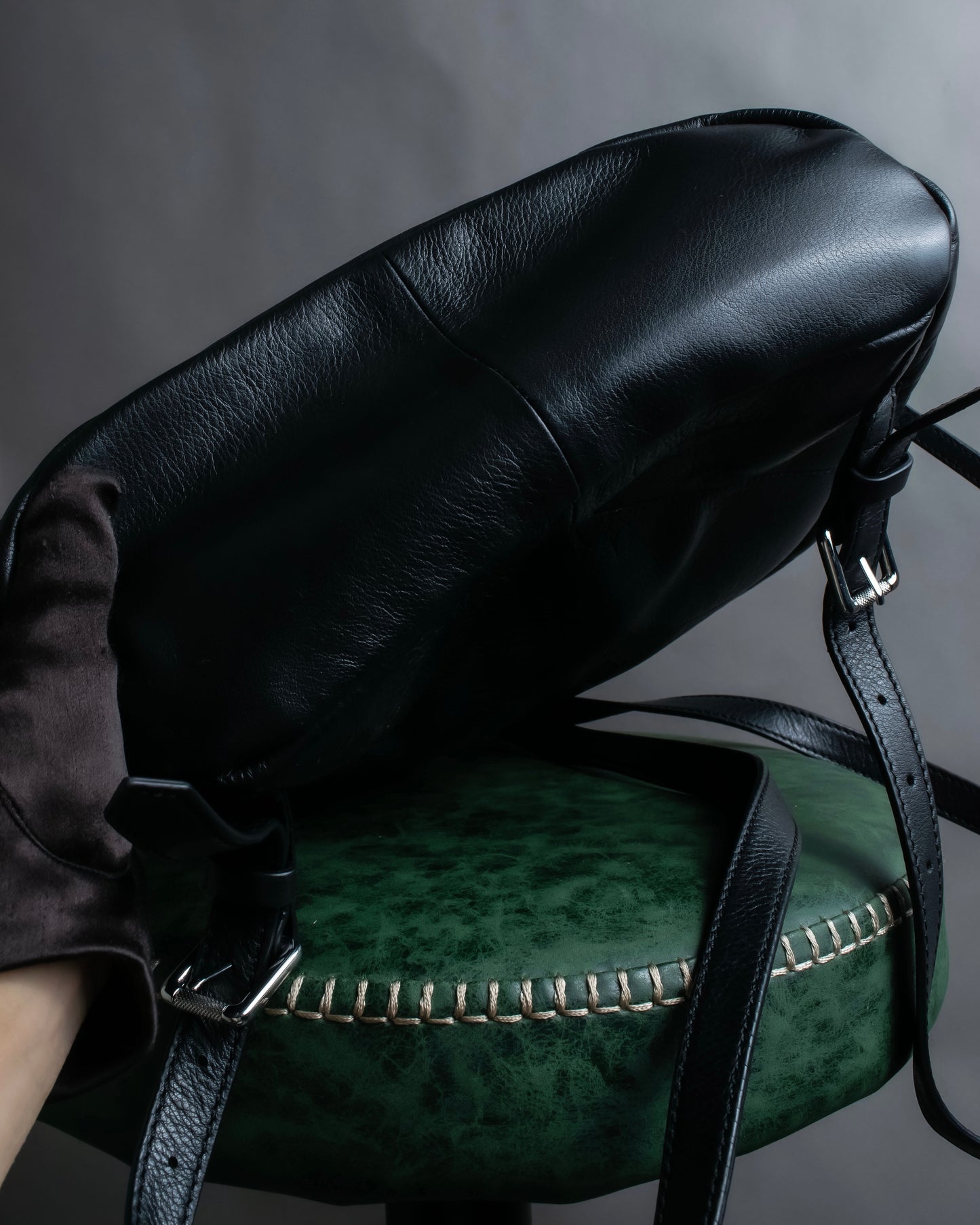 "DIESEL" Decorative zip design leather backpack