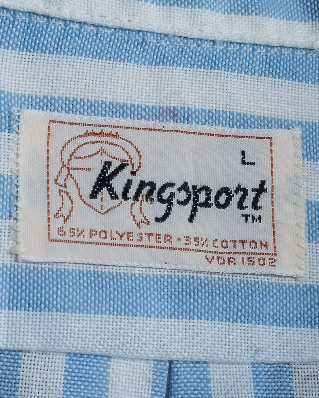 "Vintage light blue striped button-down shirt"