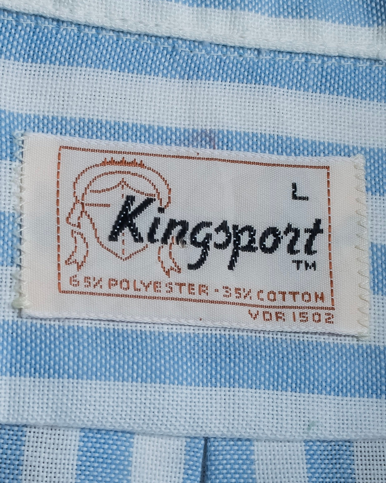 "Vintage light blue striped button-down shirt"