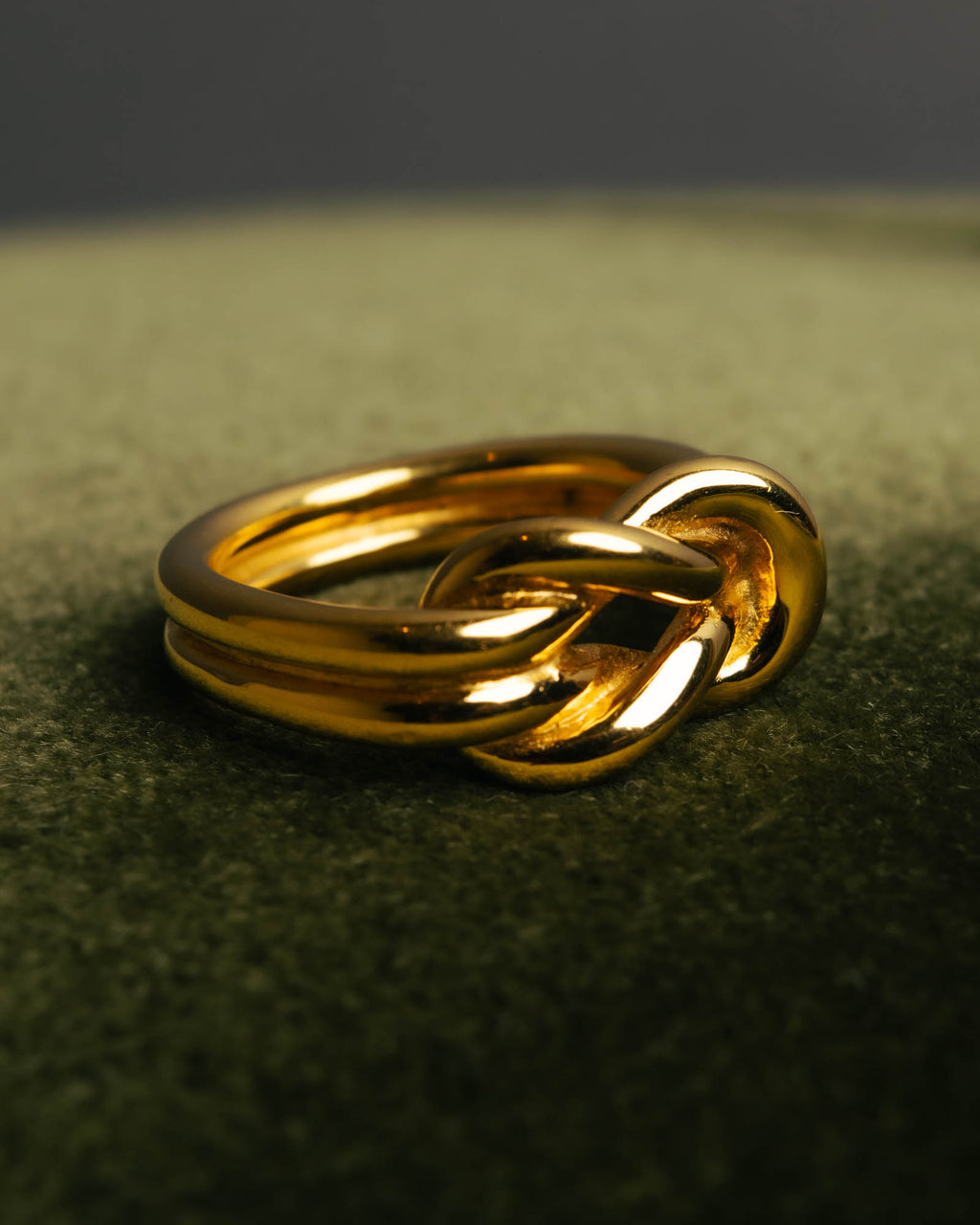 "HERMES" Sculptural gold tone knot Atame scarf ring