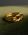 "HERMES" Sculptural gold tone knot Atame scarf ring