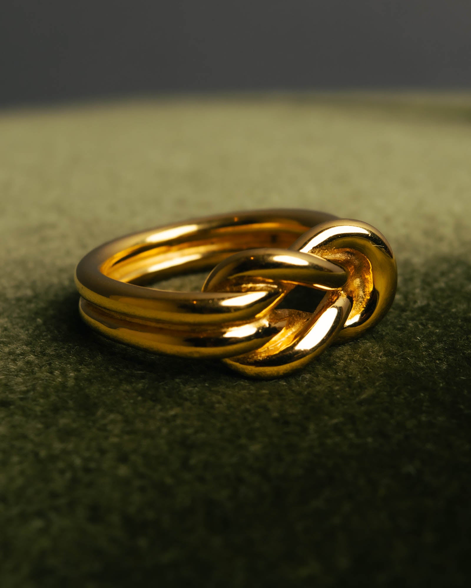 "HERMES" Sculptural gold tone knot Atame scarf ring