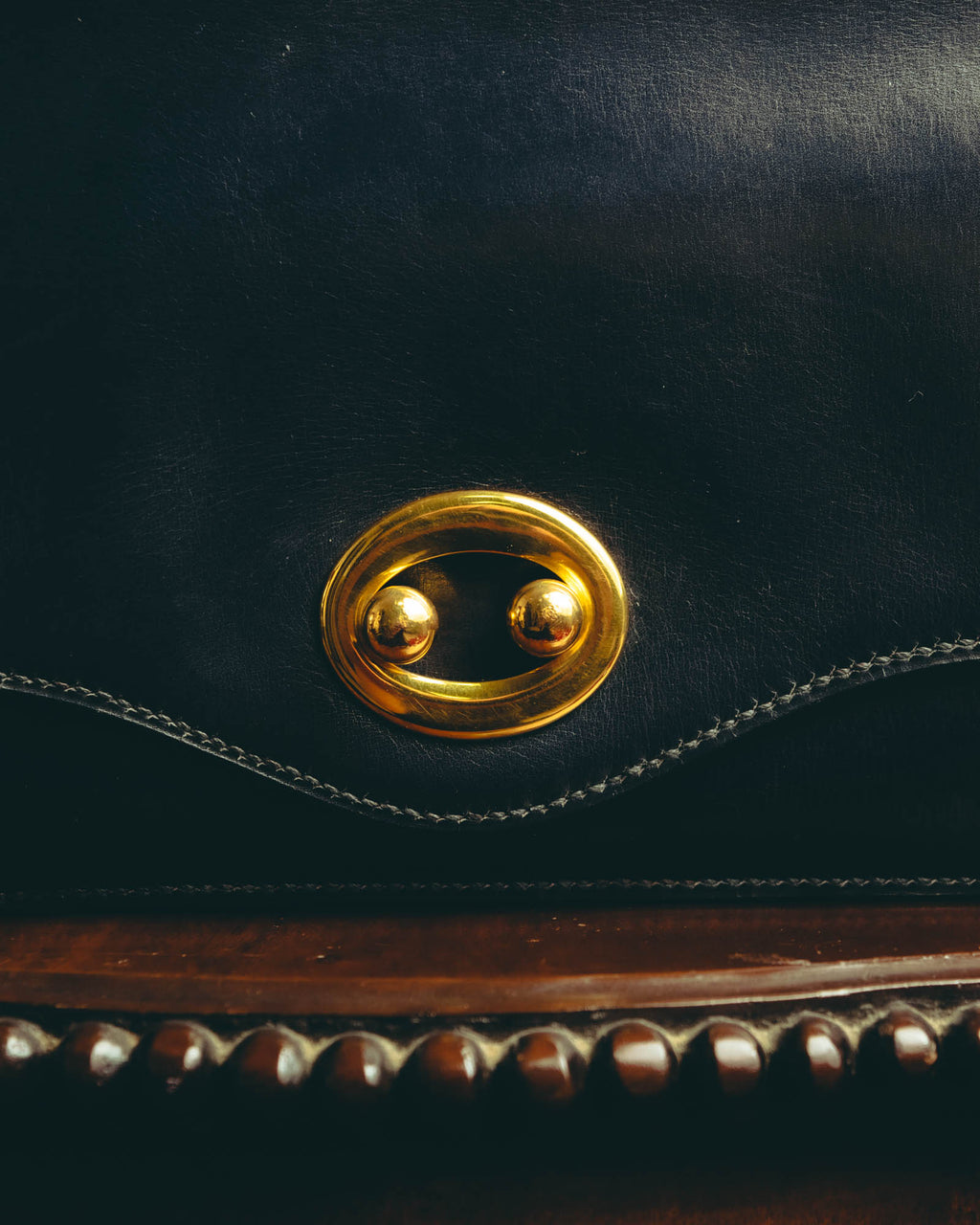 -SPECIAL- “HERMÈS” 50’s-60’s sculptural oval clasp midnight navy leather handbag