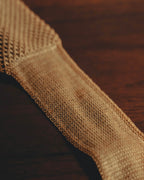 “COMME des GARÇONS HOMME”
80’s-90’s open-knit square-end necktie
