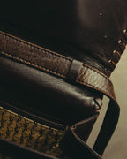 “Yves Saint Laurent” 70’s-80’s Perforated logo leather tassel shoulder bag