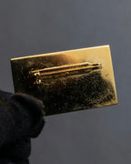 "CHANEL" Logo engraved gold plate brooch