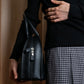 "MORABITO" Half moon design grained leather handbag