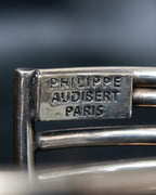“PHILIPPE AUDIBERT” Crossed 5 line silver bangle