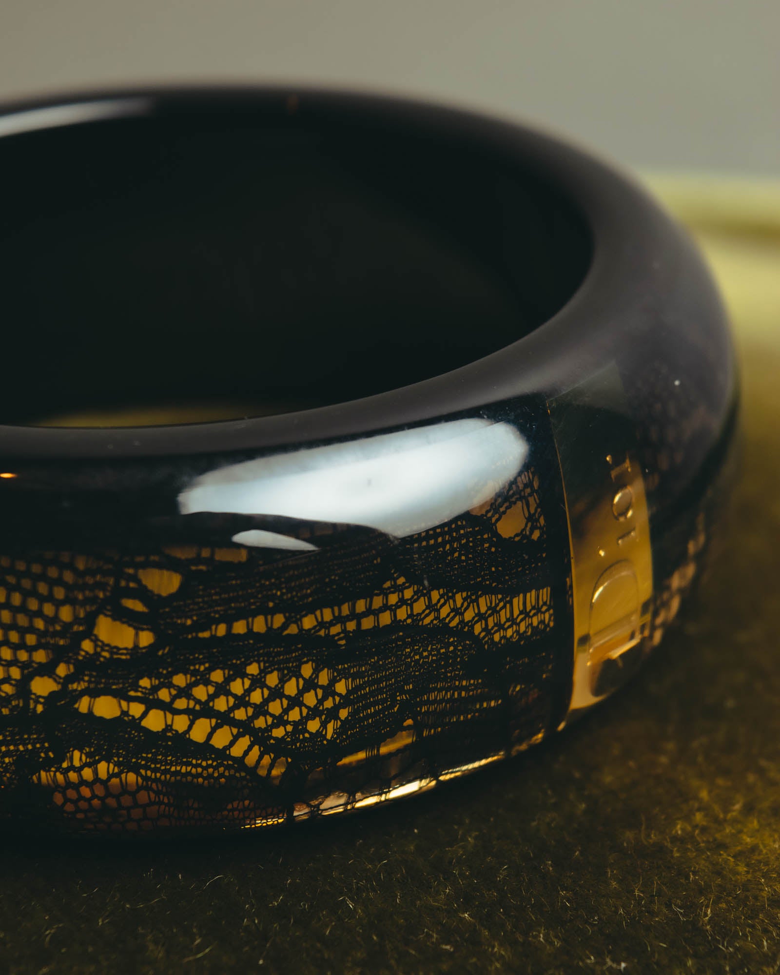 “Dior” 2002-2010 Lace embedded lucite bangle