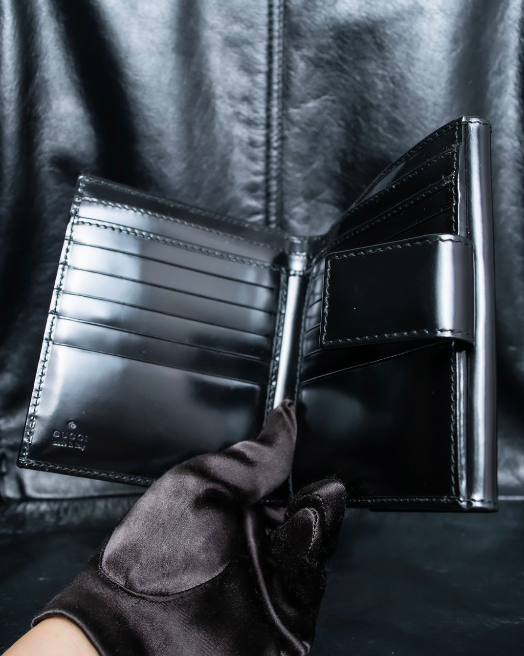 "GUCCI" Canvas and leather bi-fold wallet