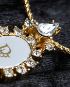 "Christian Dior" Trotter logo engraved gold pendan