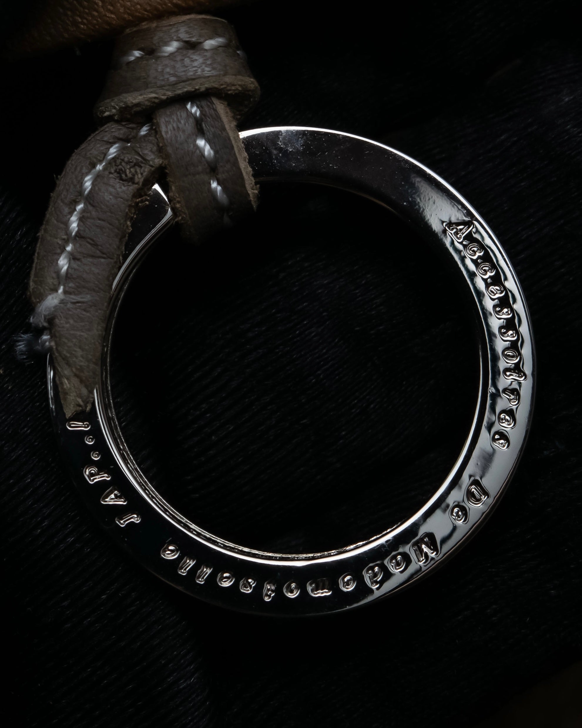 "Mademoiselle Accessories"
 Silver parts design leather one handle bag