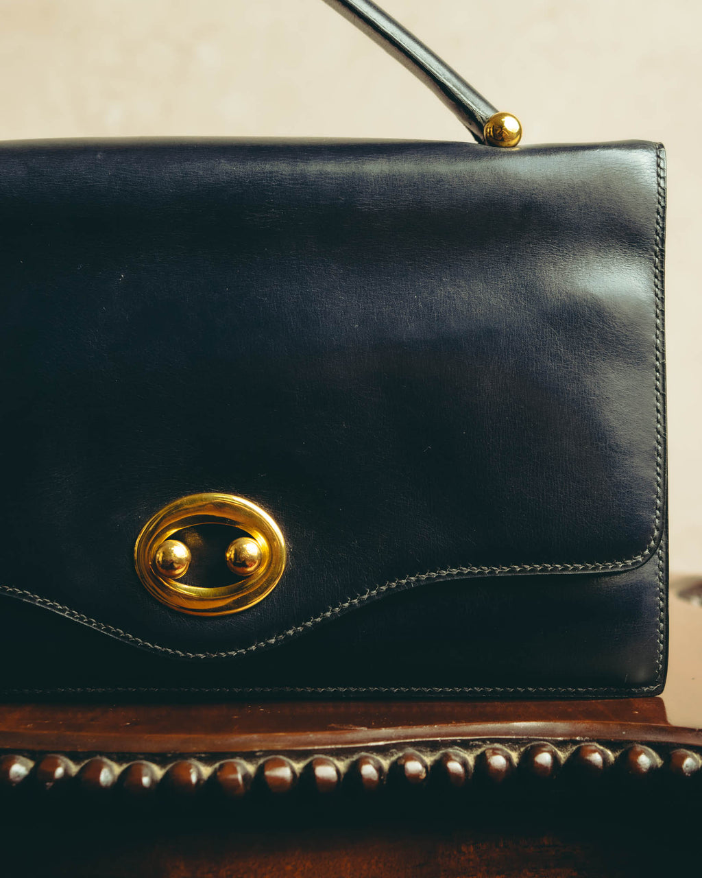 -SPECIAL- “HERMÈS” 50’s-60’s sculptural oval clasp midnight navy leather handbag