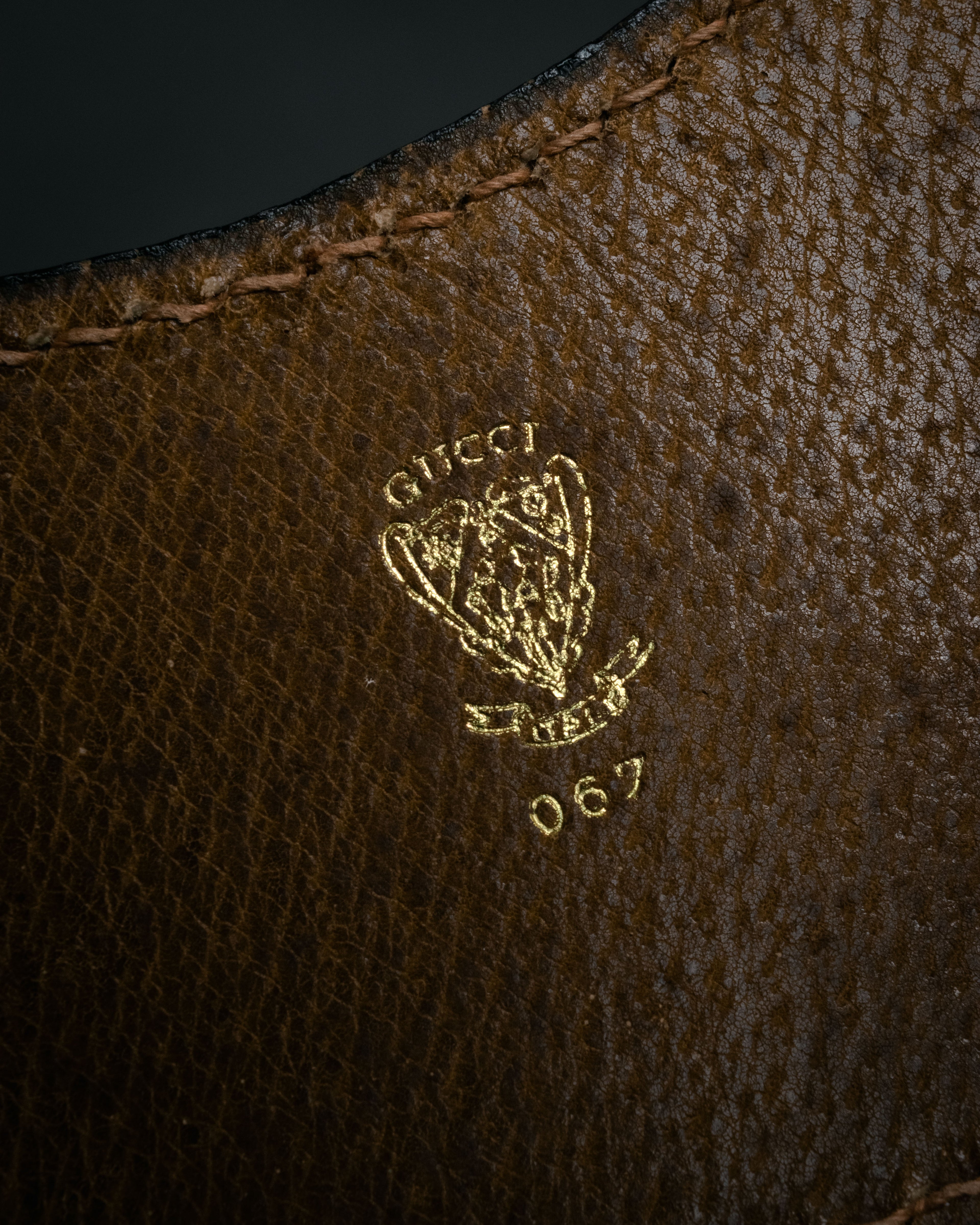 “GUCCI” Late 70’s-early 80’s suede and leather cutout handle bag