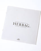 トップパーツと織物製ボディを取り外して組み立てる手順を記した、旧型Herbag用の説明書。表紙には「HERBAG」と組み立て説明の表記が確認できます。