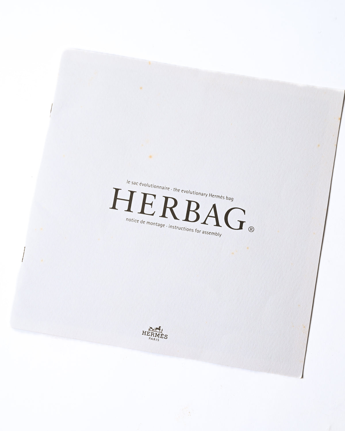 トップパーツと織物製ボディを取り外して組み立てる手順を記した、旧型Herbag用の説明書。表紙には「HERBAG」と組み立て説明の表記が確認できます。