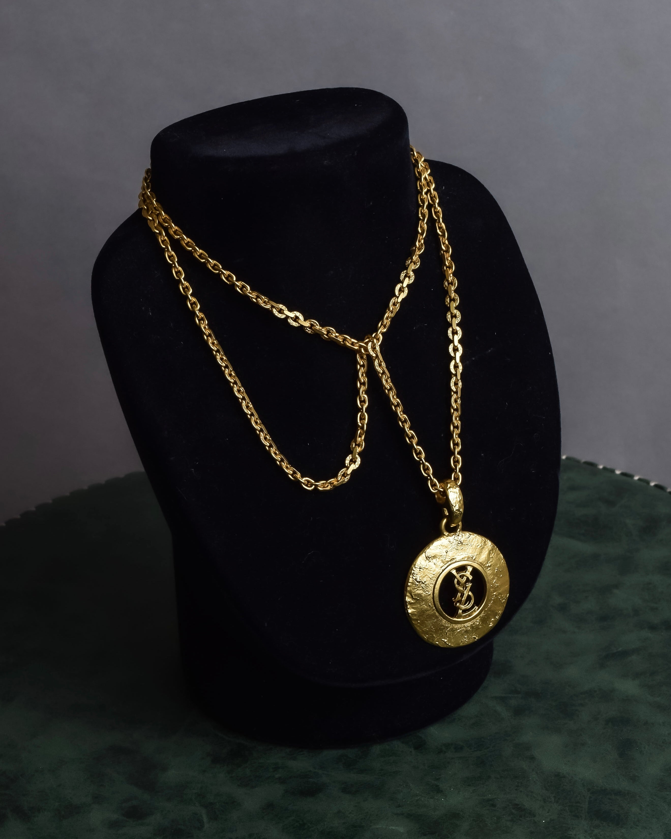 "YVES SAINT LAURENT" Embossed medallion YSL charm necklace