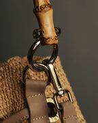 “Heidi Klein” Natural raffia bamboo handle bucket bag