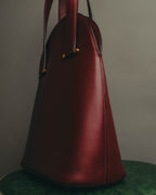 "Cartier" 80's-90's Bordeaux leather handbag