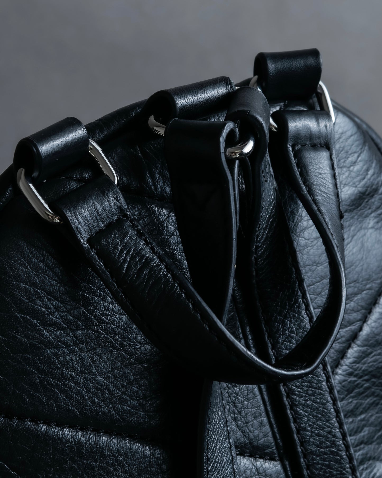 "DIESEL" Decorative zip design leather backpack