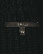 首元内側に配されたGUCCIのブランドタグと、XS表記のサイズタグを確認できるカット。タグ表記はMADE IN ITALY。