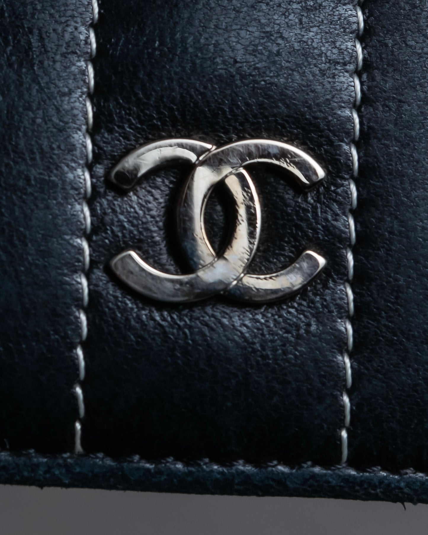 "CHANEL" Mademoiselle line design coco mark engraved bi fold wallet