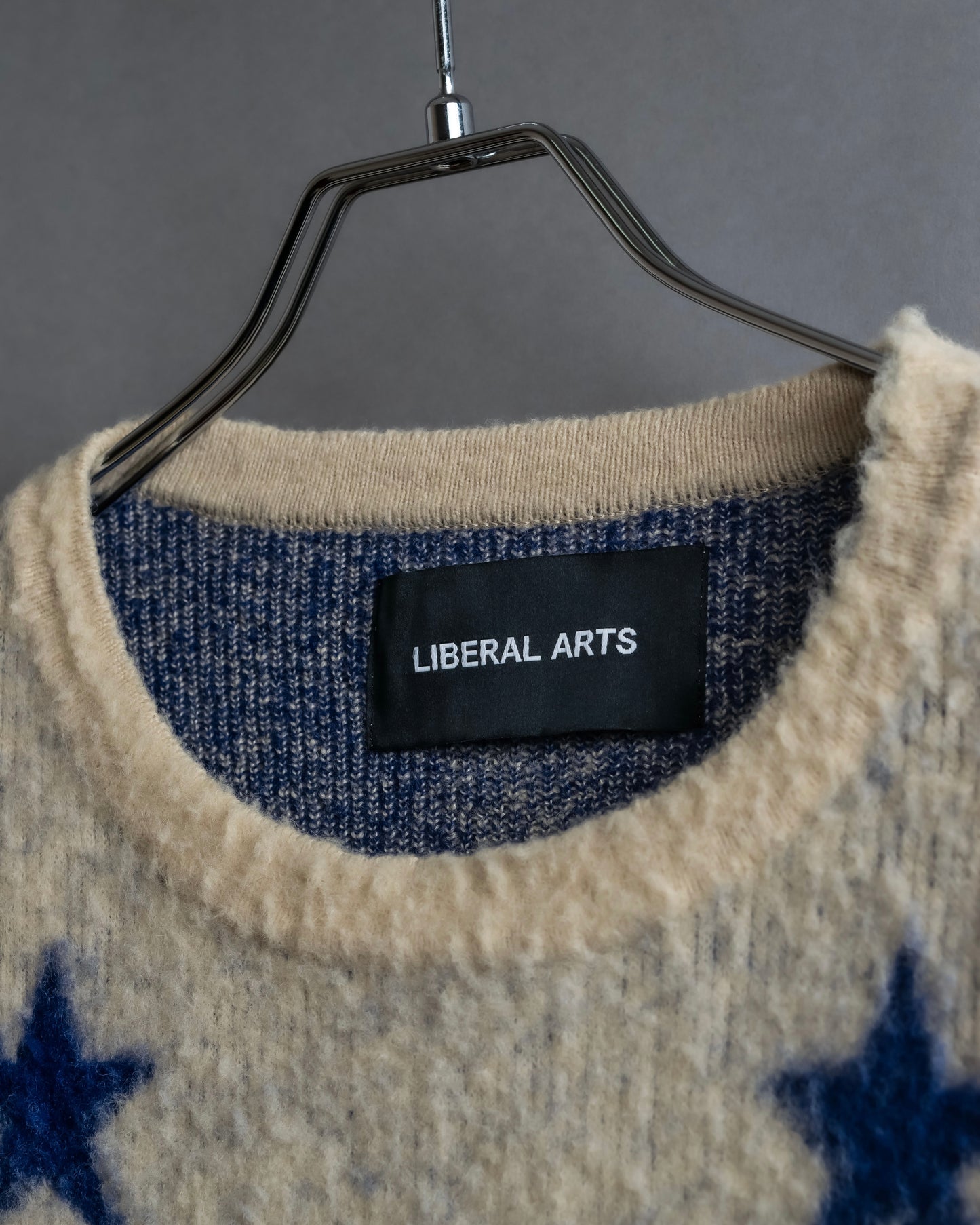 "LIBERAL ARTS" Star pattern oversized knit pullover