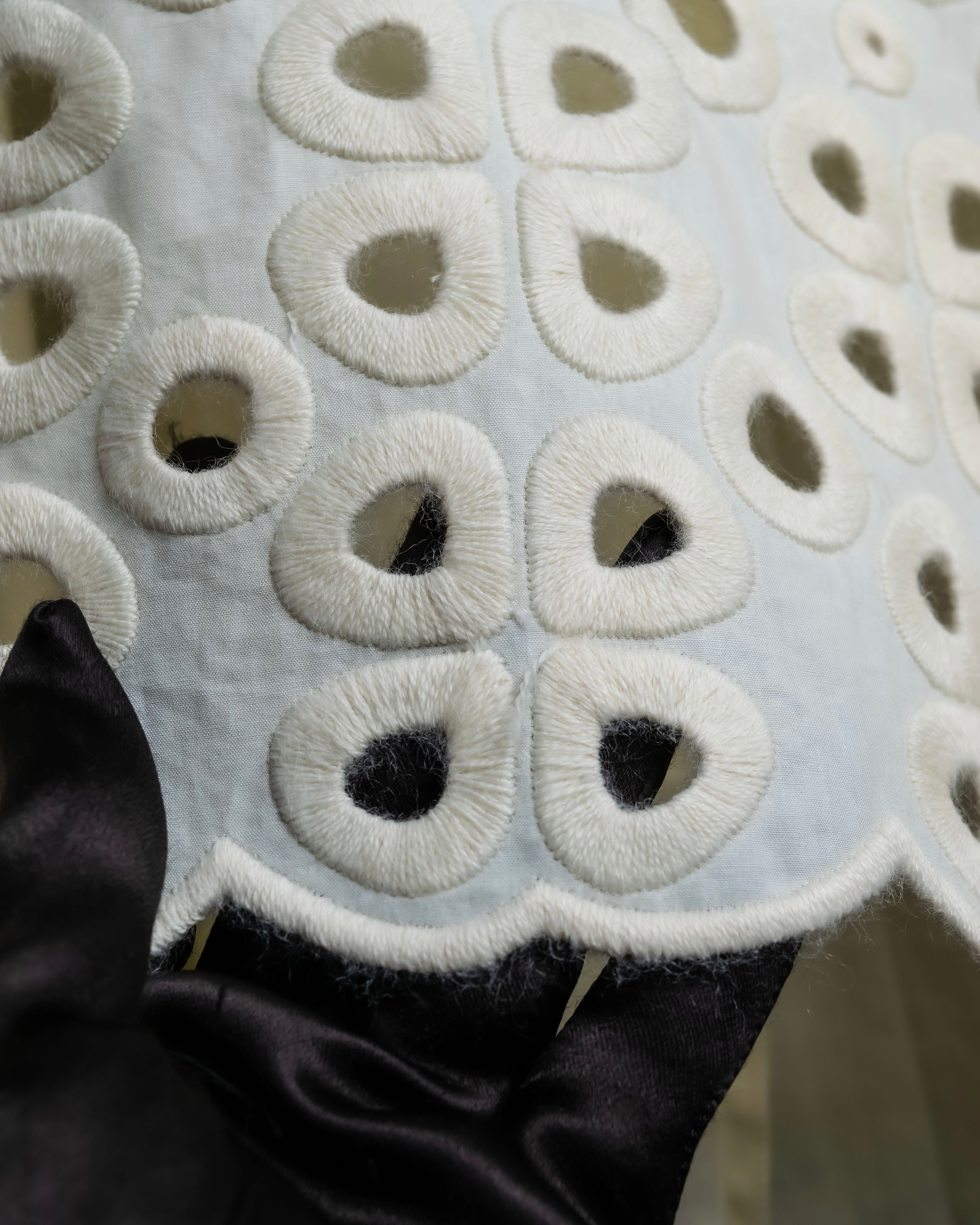 "FENDI" hole pattern and tack designed skirt