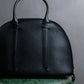 "MORABITO" Half moon design grained leather handbag