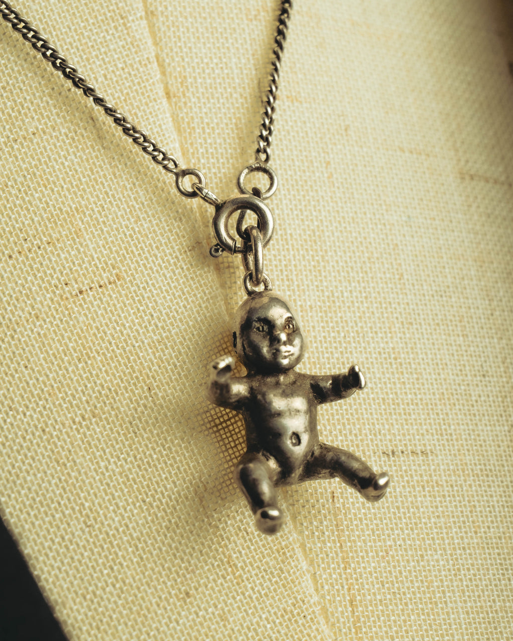 "Saint Laurent" 10's-20's Sculptural doll pendant necklace