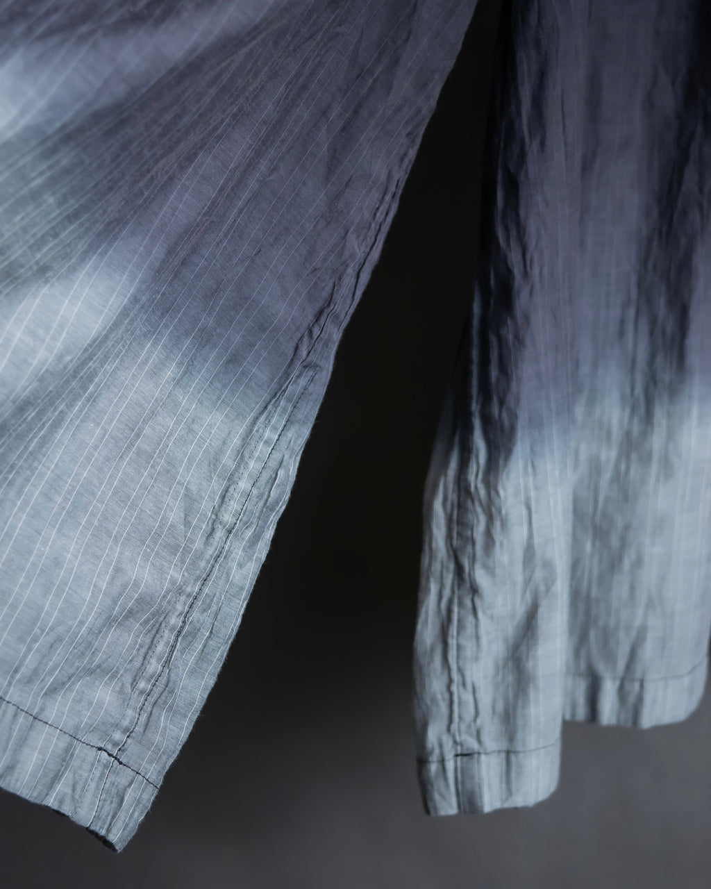 "me ISSEY MIYAKE"
 Color gradient washer processed pants