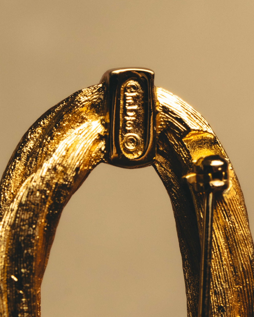 "Christian Dior" 70's Textured gold tone brooch