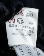 "ISSEY MIYAKE" Gathered waist detail button slide flared skirt