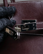 "HAMANO TOKYO" Trapezoidal shape iconic hardware leather one handle bag