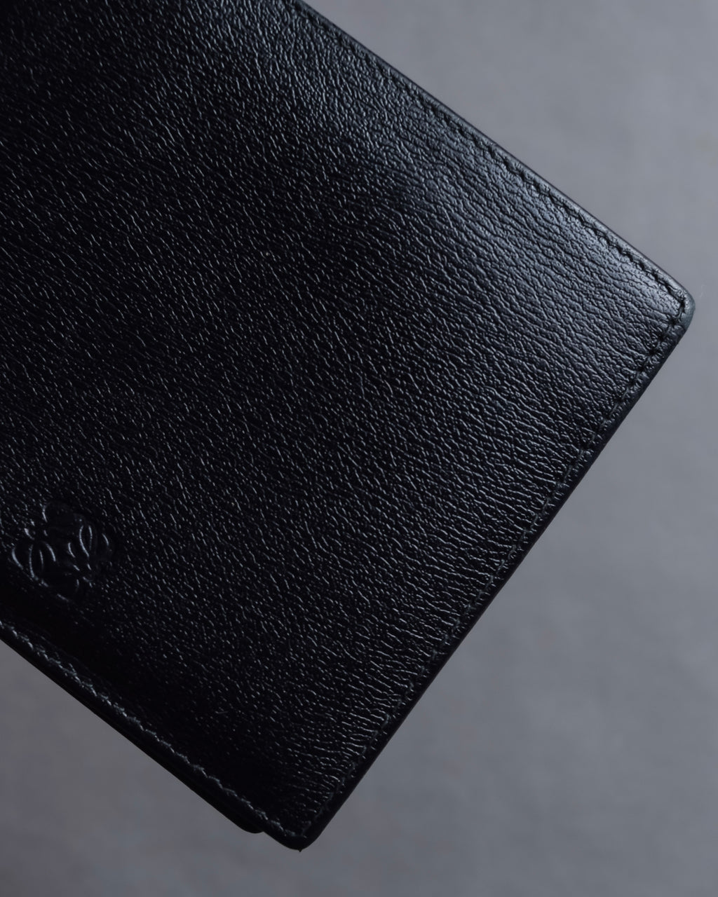 "LOEWE" Logo engraved bi-fold leather wallet