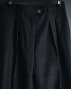 "CHANEL" high-waisted pleated trousers with signature gold button