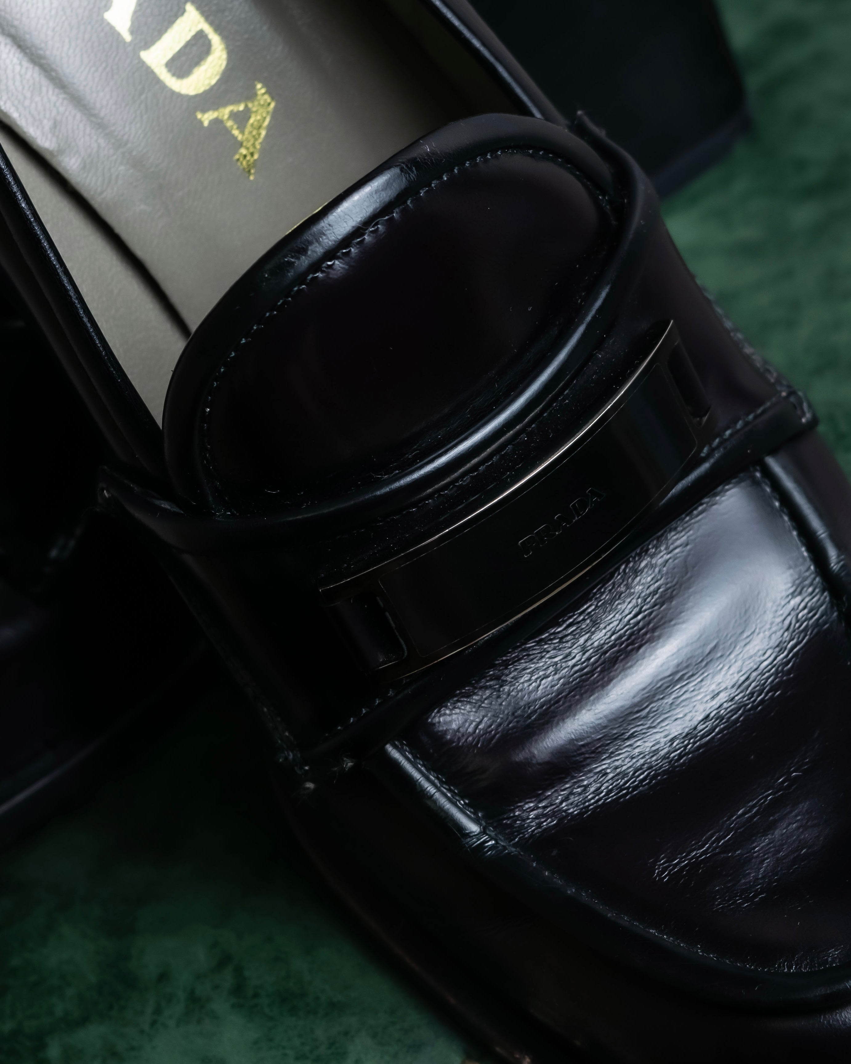 "PRADA" Metal band design leather heel loafers