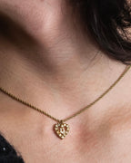 "Christian Dior" Rhinestone studded CD logo design in gold necklace