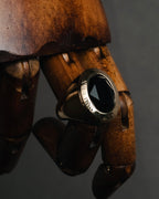 "Alexander McQueen" 10’s black stone signet ring