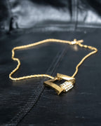 "YVES SAINT LAURENT" rhinestone motif gold necklace