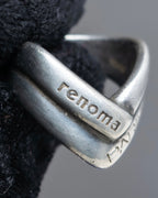 "renoma PARIS" Two-strand cross design smooth curved silver ring