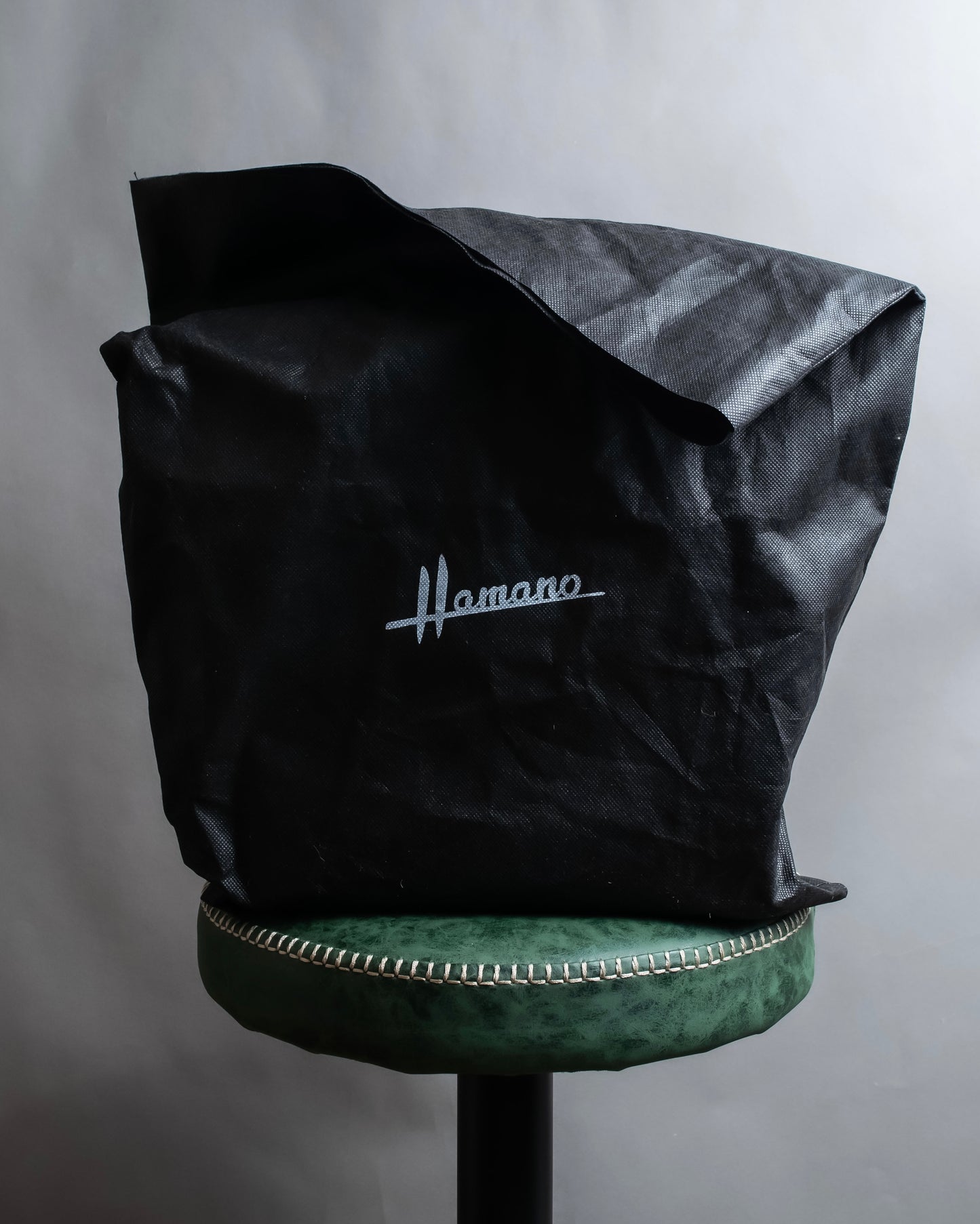 "HAMANO TOKYO" Trapezoidal shape iconic hardware leather one handle bag