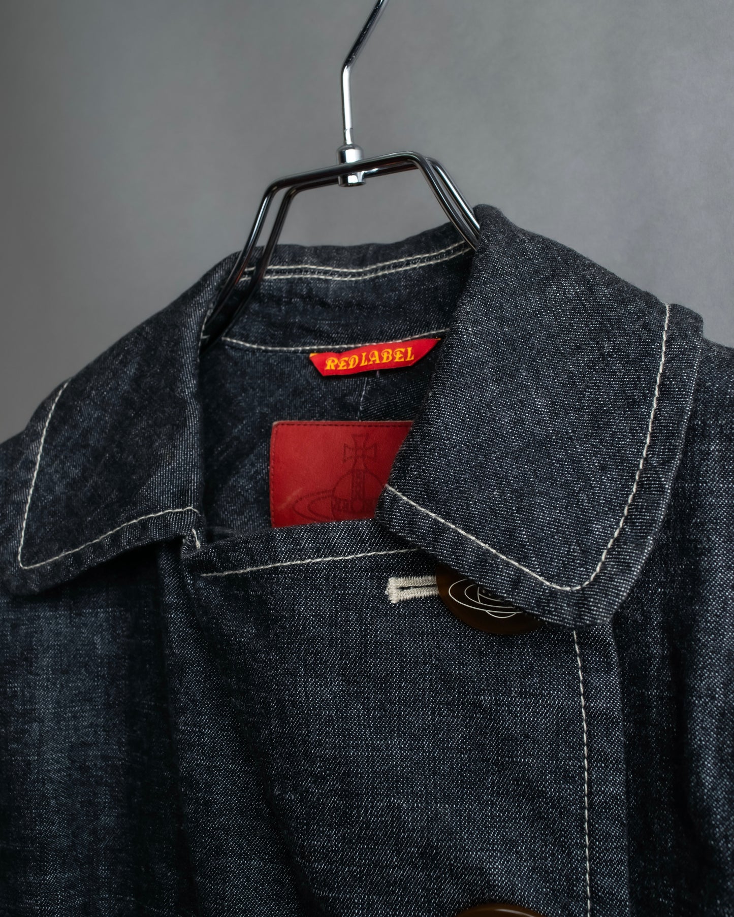 "Vivienne Westwood RED LABEL" Asymmetrical button design mid length denim coat