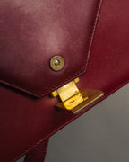 “Cartier” 80’s-90’s Must de Cartier burgundy leather shoulder bag