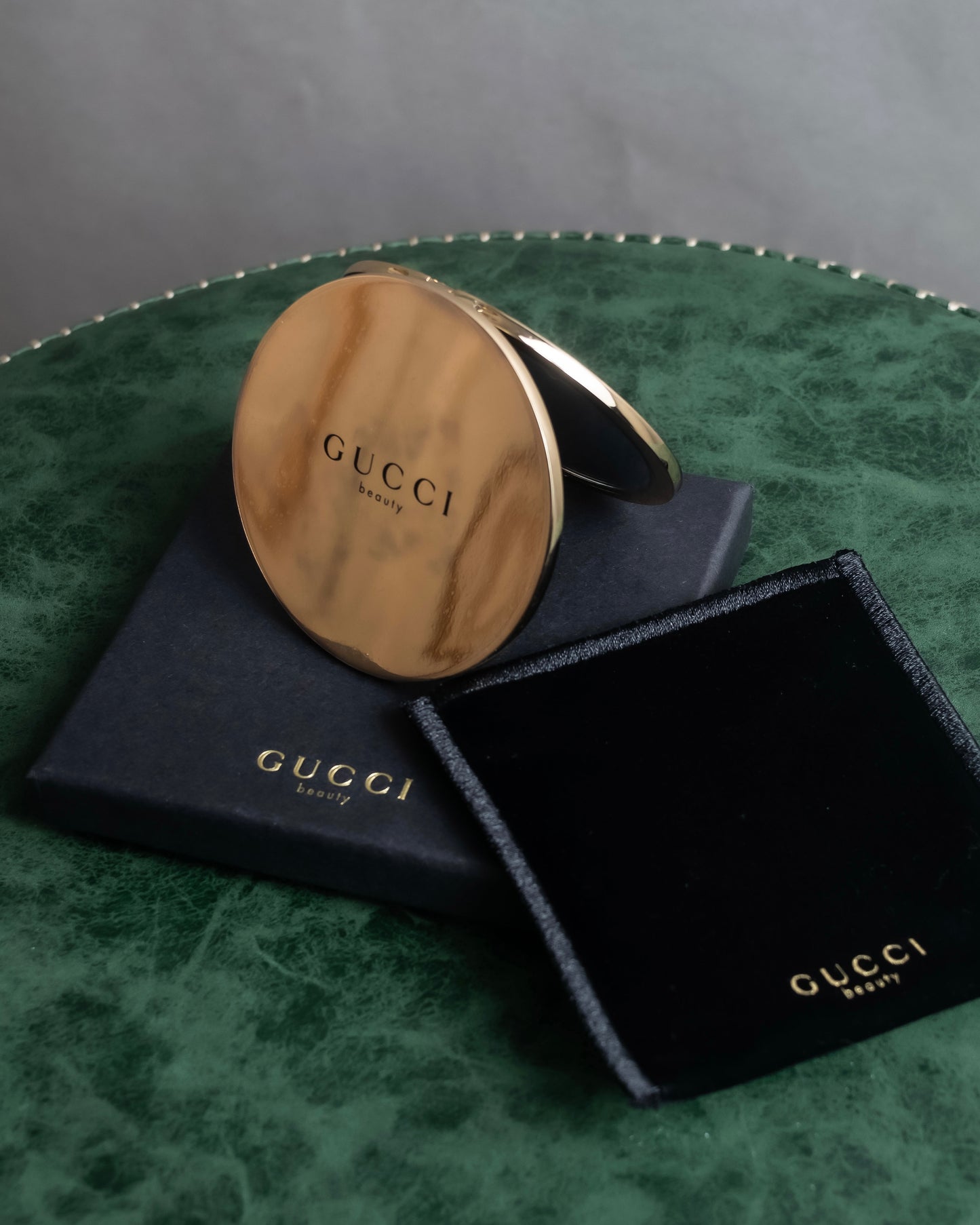 "GUCCI" Gold metal design logo engraved hand mirror